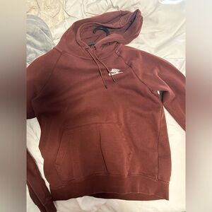 brown nike hoodie, size small, brand new.